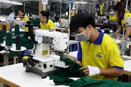 Garment production at Maxport Garment Company in Nam Dinh province. (Photo: VNA)