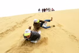 Great fun sand boarding in Nui Ne