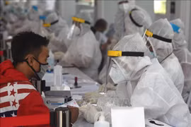 Indonesia reports highest daily COVID-19 death toll, Philippines deploys police to quarantine patients