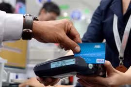 Central bank asks for cut in electronic fund transfer fees