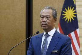 Malaysia PM self-quarantines, Philippines reopens public schools