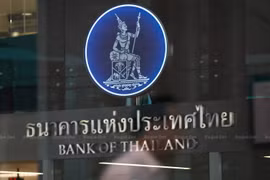 Thailand’s central bank cuts key interest rate to record low