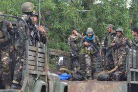 Philippine forces kill four Abu Sayyaf suspects 