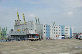 Singapore to house foreign workers in vessels as COVID-19 spreads