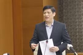 Minister urges tightening of COVID-19 measures