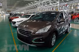 Imports of automobiles rise in July