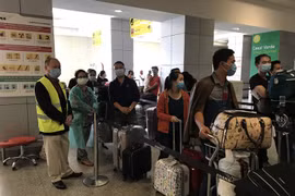 Nearly 310 Vietnamese citizens return home from Angola