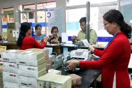 Reference exchange rate down 10 VND on June 11