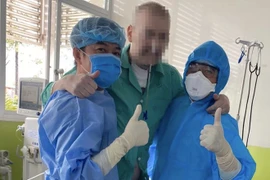 British pilot able to stand, undergoing physical therapy