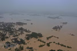 Record flooding kills 84 in central region so far