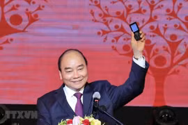 PM calls on Vietnamese to support poor people ahead of Tet