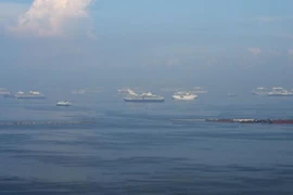 At least 12 Filipinos missing in boat collision 