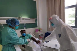 Lao sees positive signs in controlling COVID-19 