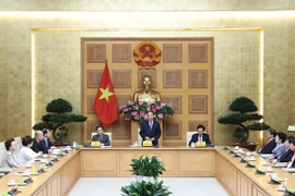 Government leader meets national brand enterprises