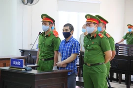 Man causing blast at Binh Duong taxation department gets 11-year jail term