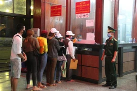 Vietnamese, Lao provinces enhance coordination in fighting COVID-19