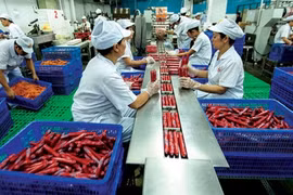 Food processing firms step up production, focus on safety measures for workers