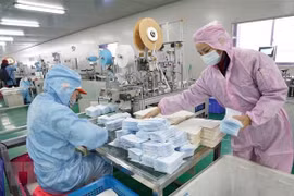 Cambodia encourages garment factories to produce masks, medical supplies
