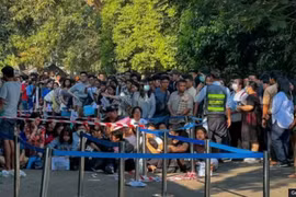 There were long queues outside foreign embassies in Yangon in February (Photo: Getty images)
