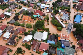 An aerial view of the flooded residential zone in Tha Wang Pha district in Nan on August 22. (Photo: Disaster Response Association of Thailand Facebook Page)