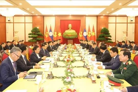 Talks between Vietnamese Party General Secretary and State President To Lam and his Lao counterpart (Photo: VNA)