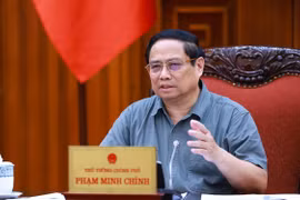 Prime Minister Pham Minh Chinh chairs a meeting between permanent cabinet members and the standing board of the sub-committee for socio-economic affairs of the 14th National Party Congress on September 9. (Photo: VNA)