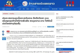 The article published on the e-newspaper of the Lao News Agency. (Photo: VNA)