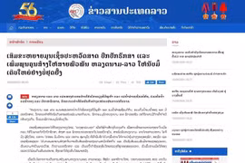 The article published on the e-newspaper of the Lao News Agency. (Photo: VNA)