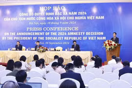 Participants at the press conference. (Photo: VNA)