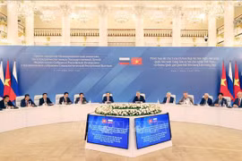 At the meeting (Photo: VNA)