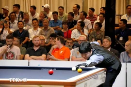 Cho Myung Woo of the Republic of Korea in the final match of the 76th World Championship 3-Cushion Individual. (Photo: VNA).