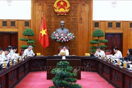 PM Pham Minh Chinh chairs a meeting between the permanent cabinet members and the steering committee for developing the project on regional and international financial centres on September 30. (Photo: VNA)