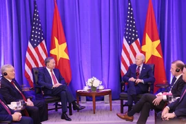 At the meeting between General Secretary of the Communist Party of Vietnam Central Committee and State President To Lam (L) and US President Joe Biden on September 25 (Photo: VNA)