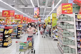 People shop at a supermarket in Bac Giang city in the northern province of Bac Giang. (Photo: baobacgiang.vn)