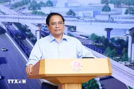 Prime Minister Pham Minh Chinh chairs the 14th meeting of the State steering committee for national key transport projects in Hanoi on September 17. (Photo: VNA)