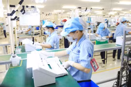 Production of electric parts at Rhythm Precision Co.,Ltd in Hanoi (Photo: Hanoi Moi)