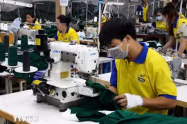 Vietnam is a key player in various global value chains, especially in manufacturing and export-oriented industries like garment and textile. (Photo: VNA)