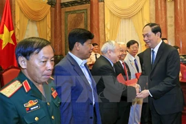 President meets former volunteer soldiers in Cambodia 