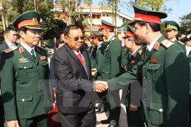 Vietnam, Laos need to further develop ties more than ever: Lao Party leader