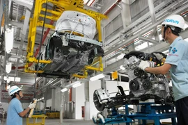 Industrial production rises slightly
