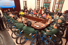 Wheelchairs given to war invalids, disabled people