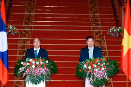 Vietnamese, Lao Prime Ministers agree to lift ties