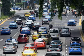 Singapore rolls out tough measures to reduce cars