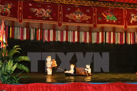 Water puppeteers perform in France