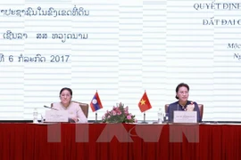 Vietnam, Laos share experience on land management