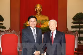 Lao PM affirms determination to boost ties with Vietnam