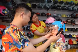 Helmet law needs reinforcement