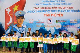 Scholarships presented to students in flood hit regions