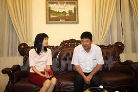 Doan Thi Huong's father visits daughter before trial 