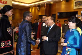 PM hosts banquet for foreign diplomats, friends on National Day